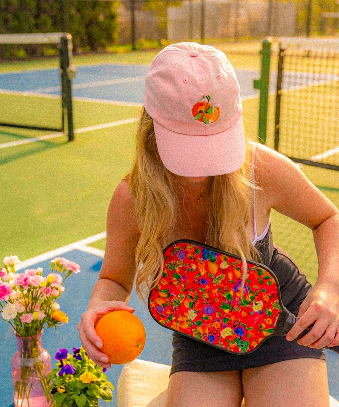 Firefly_backgroundbehindsubjectisbrightsunnyoutdoorpickleballcourt_blueandgreenco206246.jpg