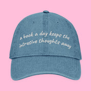 A Book a Day Embroidered Denim Hat with embroidered "A Book a Day" design