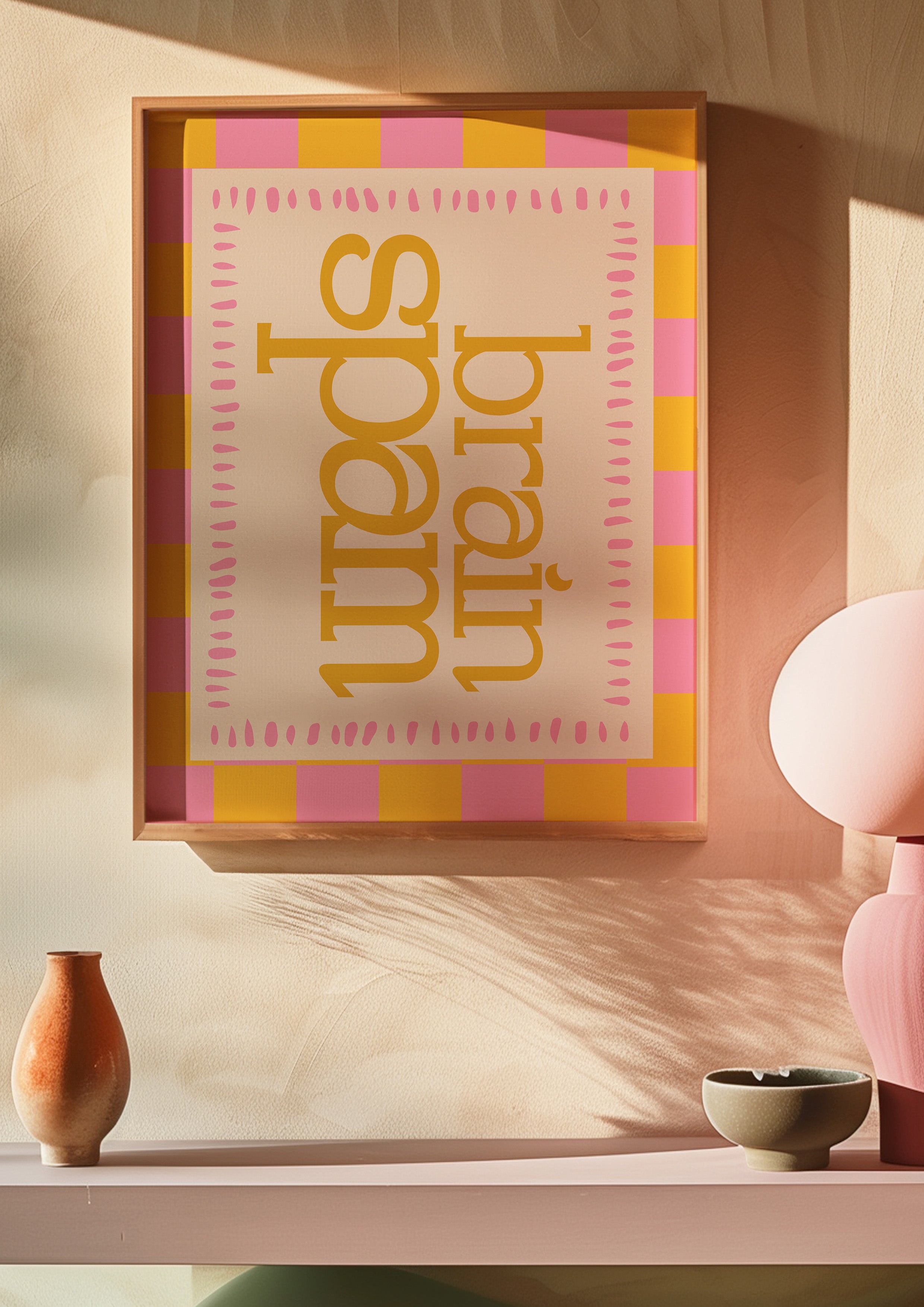 Brain Spam 24x36 mental health wall art poster framed on a warm blush wall above a pink shelf
