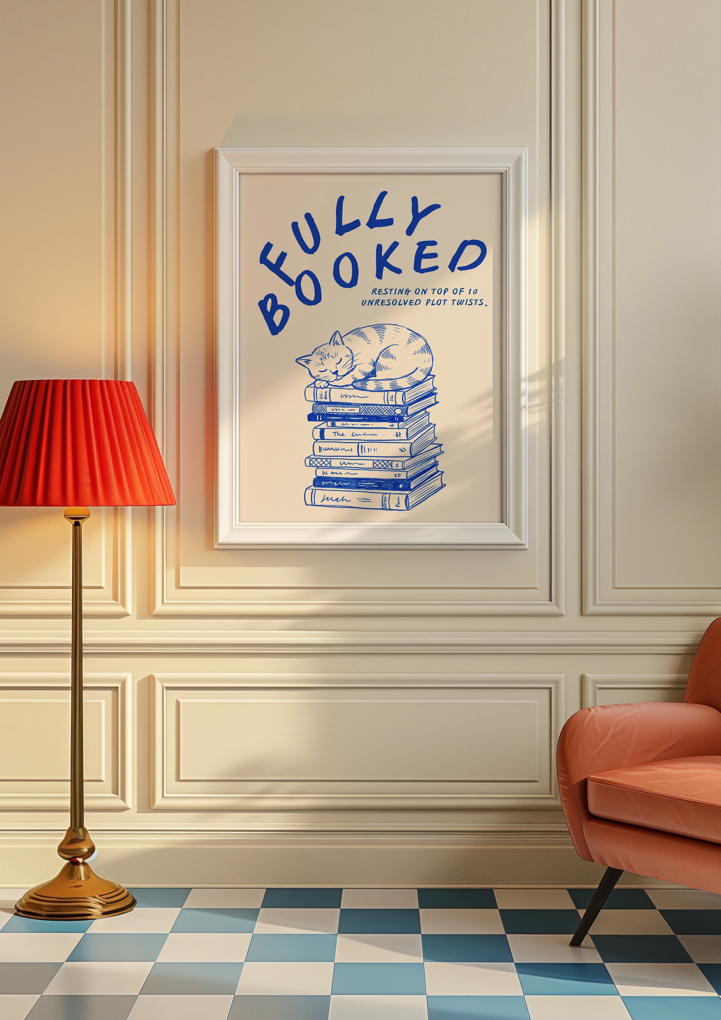 Fully Booked 24x36 bookish wall art poster framed on a cream paneled wall beside a red lamp