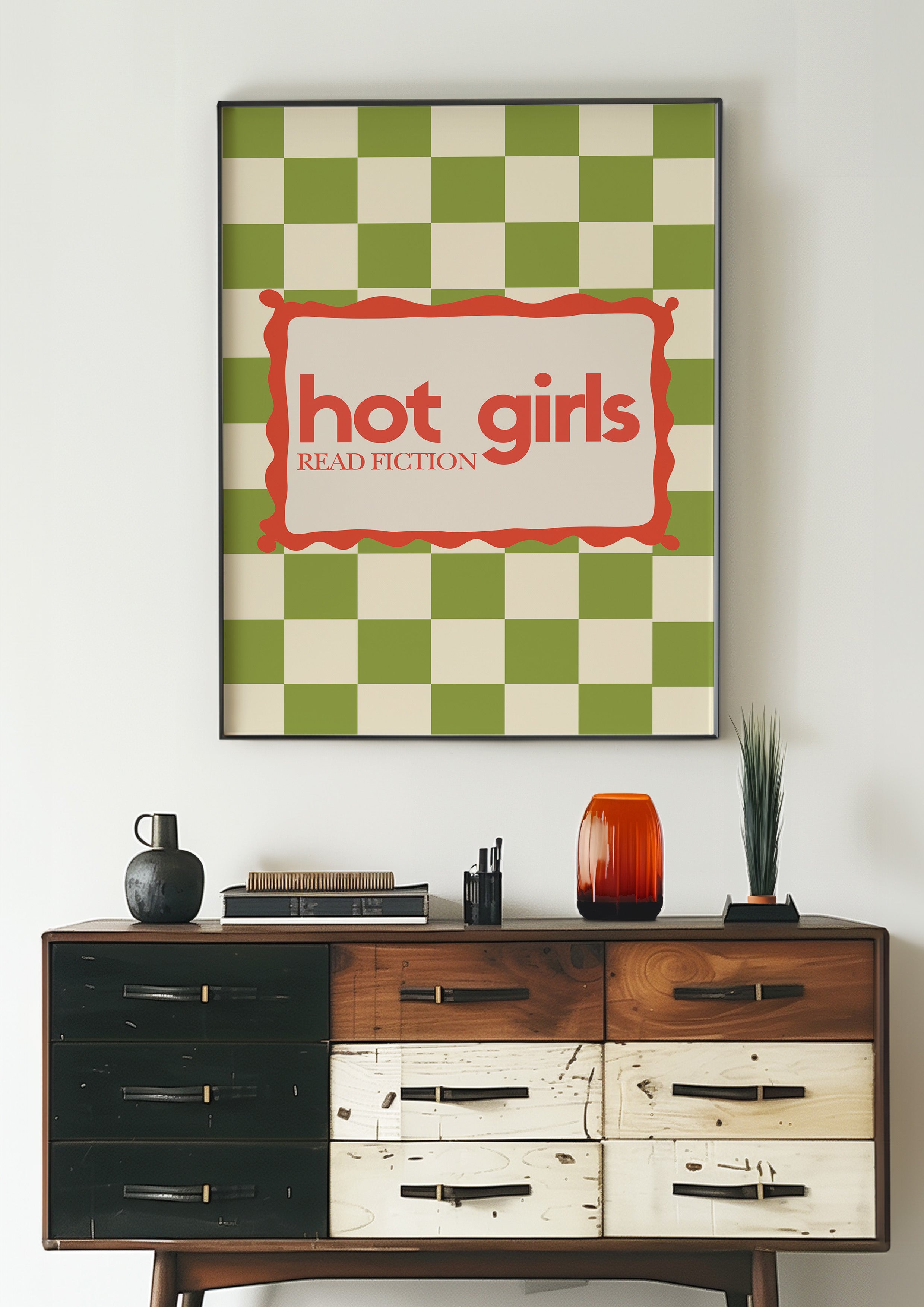Hot Girls Read Fiction 24x36 bookish wall art poster framed above a vintage wood dresser