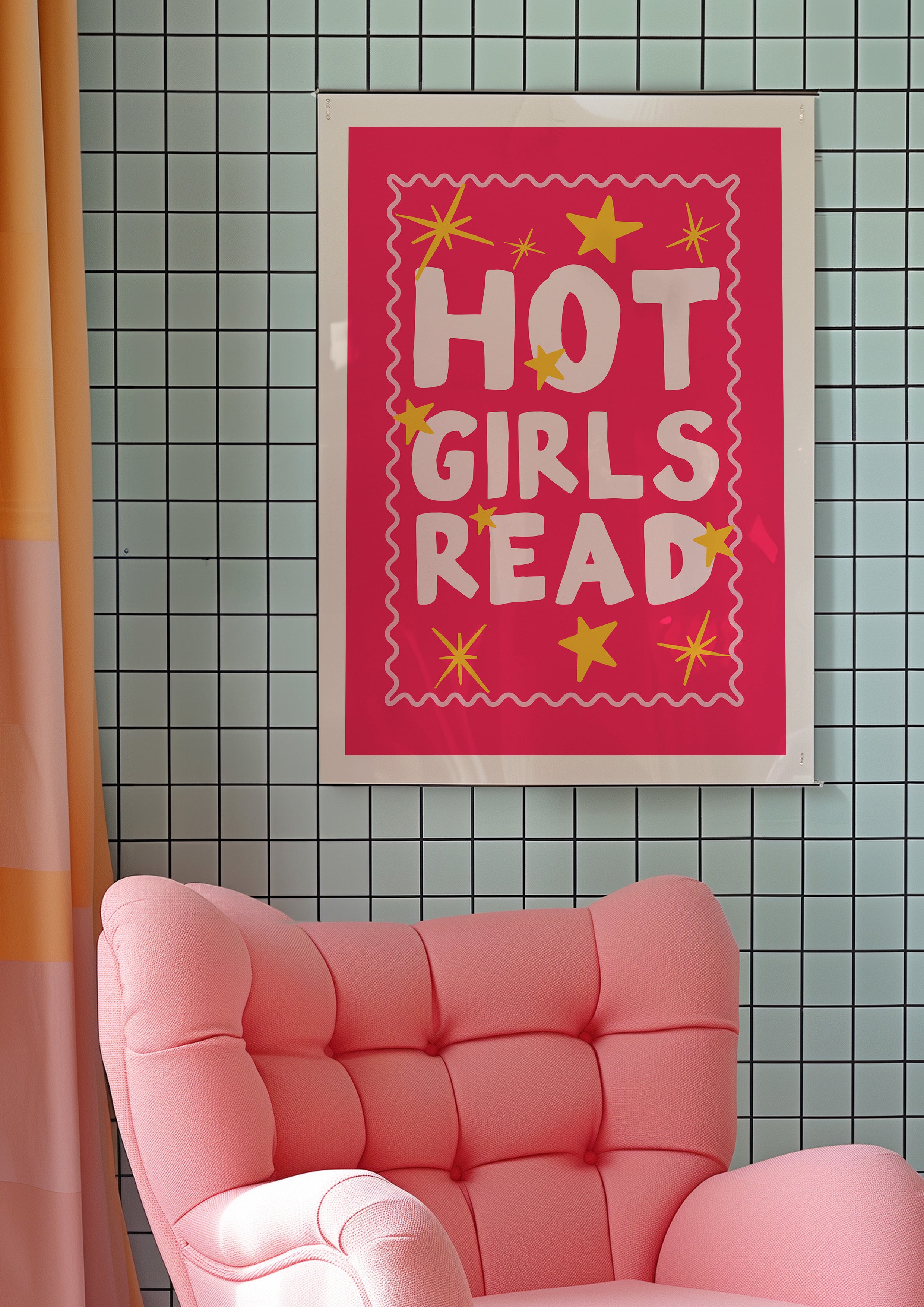 Hot Girls Read 24x36 bookish wall art poster framed above a pink armchair on a tiled wall