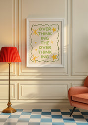 Overthinking the Overthinking 24x36 mental health wall art poster framed on a cream paneled wall beside a red lamp