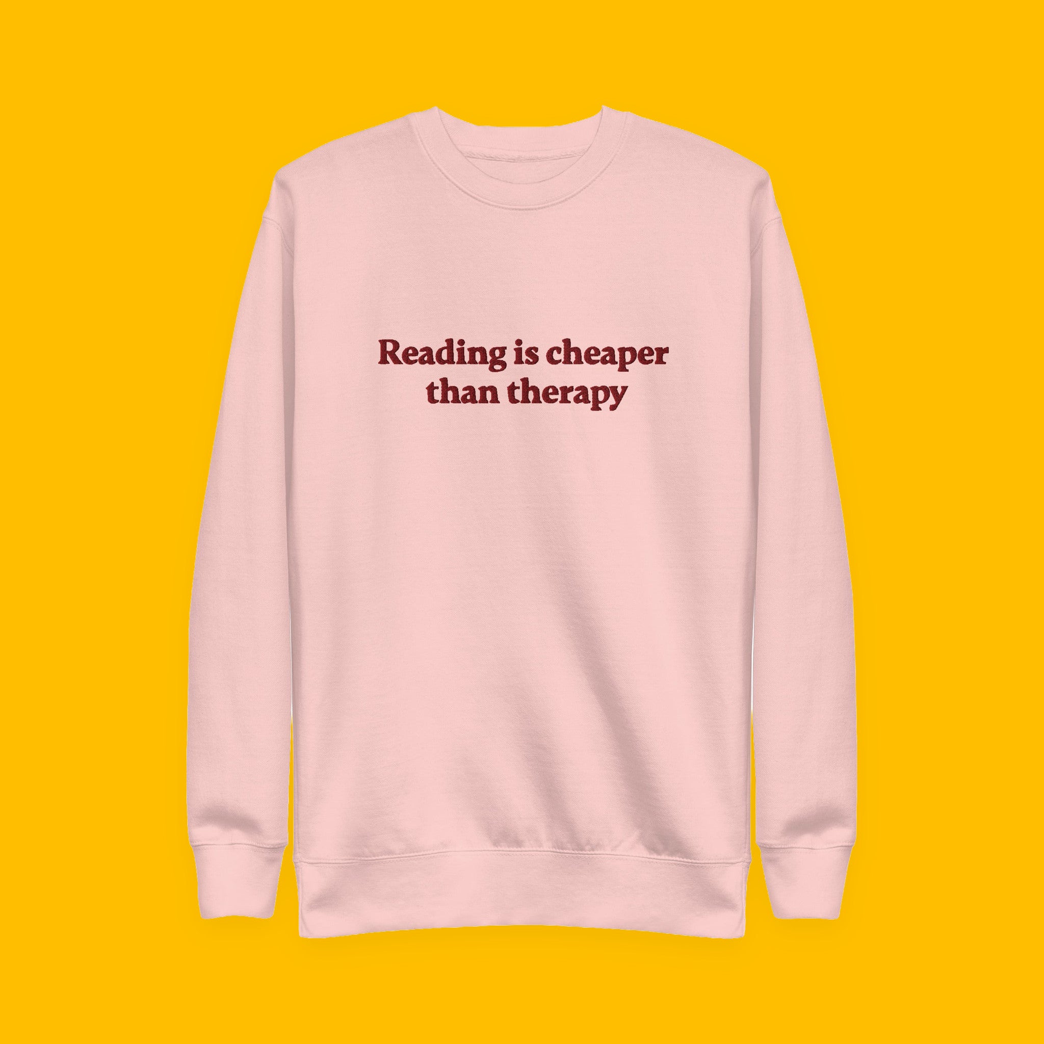 Reading Is Cheaper Embroidered Sweatshirt with embroidered "Reading Is Cheaper" design