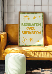 Regulation Over Rumination 24x36 mental health wall art poster propped on a mustard velvet sofa