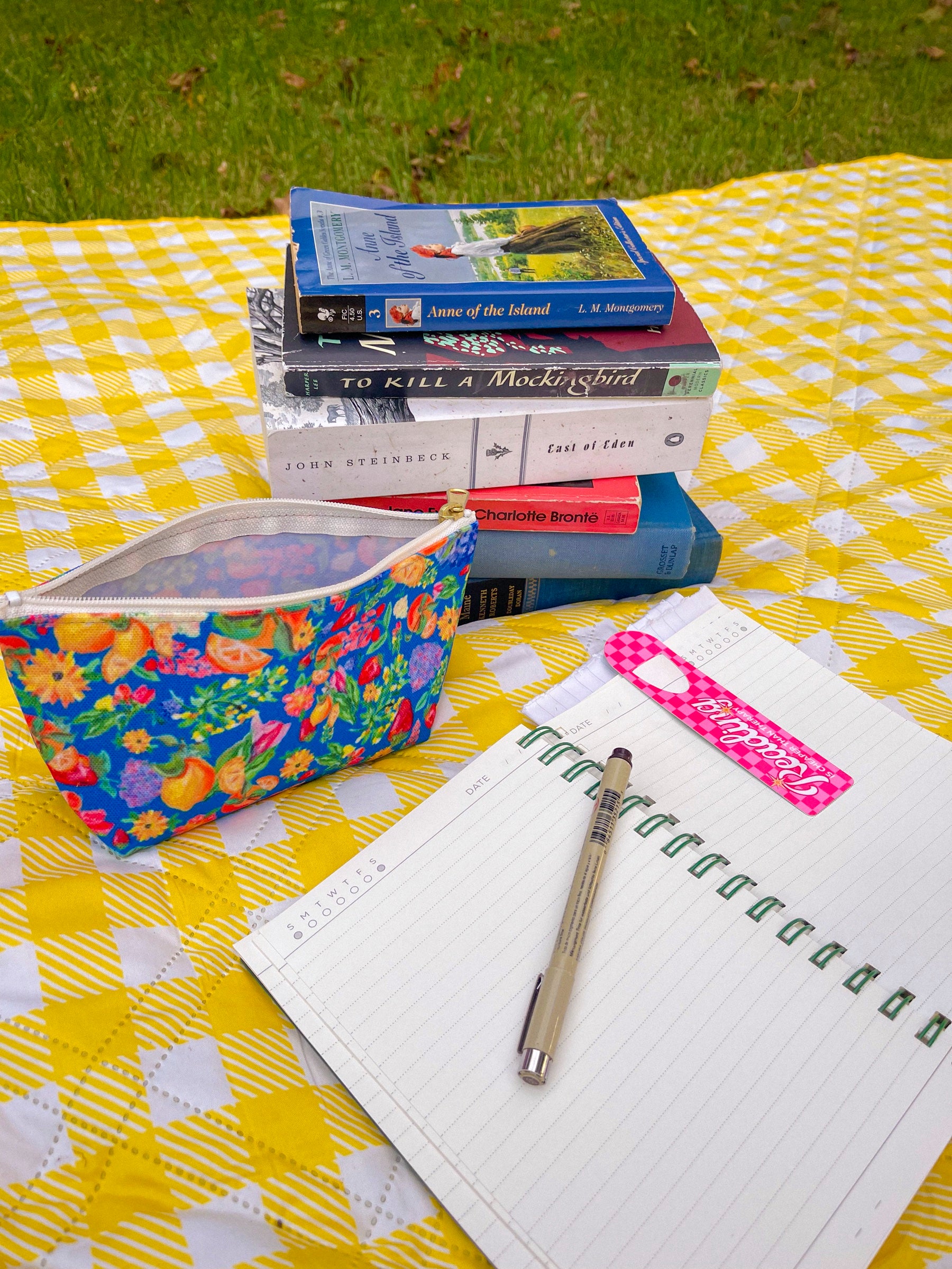 Citrus Garden in Blue pouch with a notebook, pen and pink bookmark
