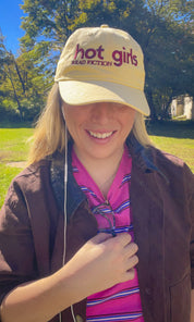 Woman wearing the Hot Girls Read Fiction embroidered coastal washed cap
