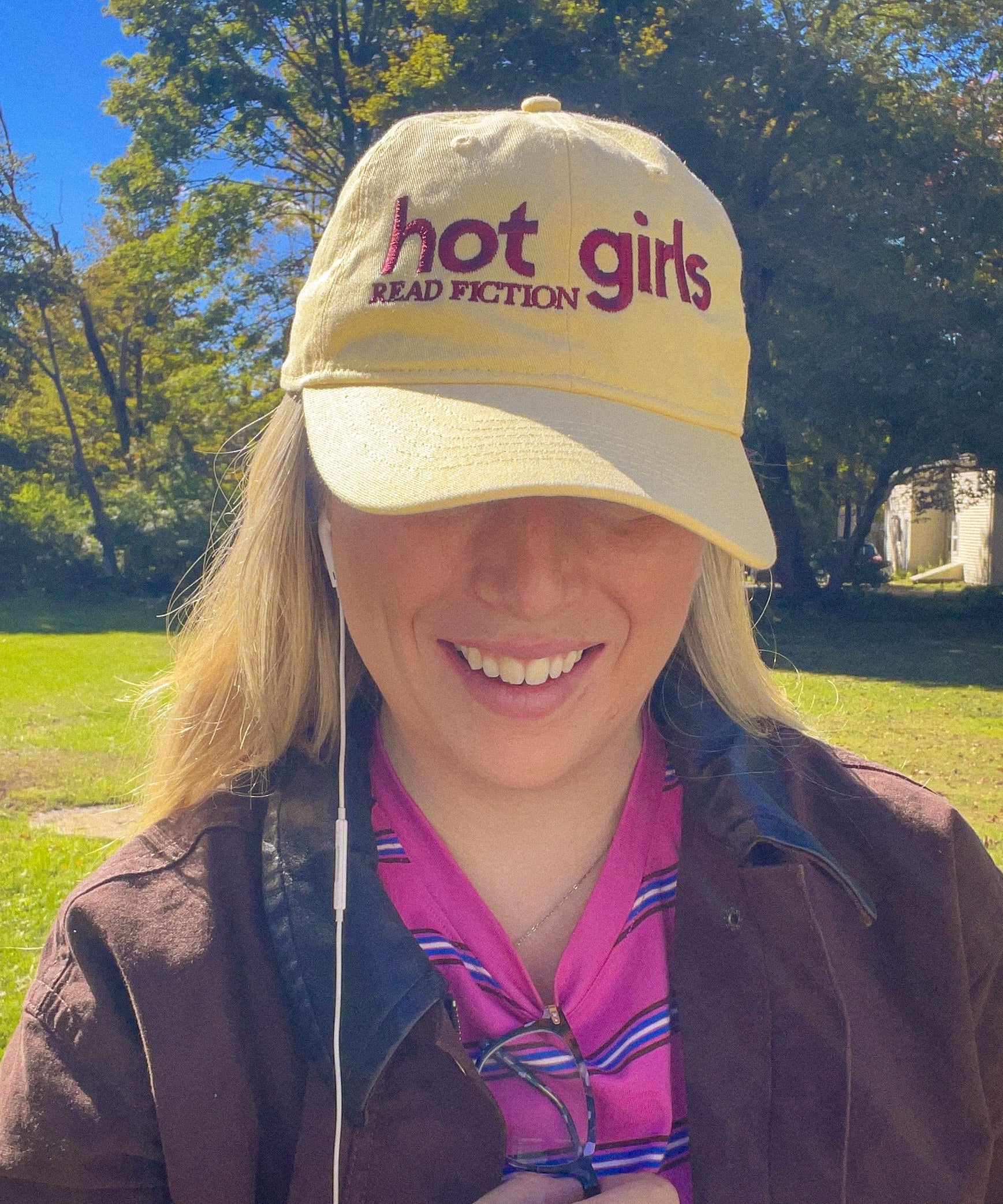 Woman wearing the Hot Girls Read Fiction embroidered coastal washed cap