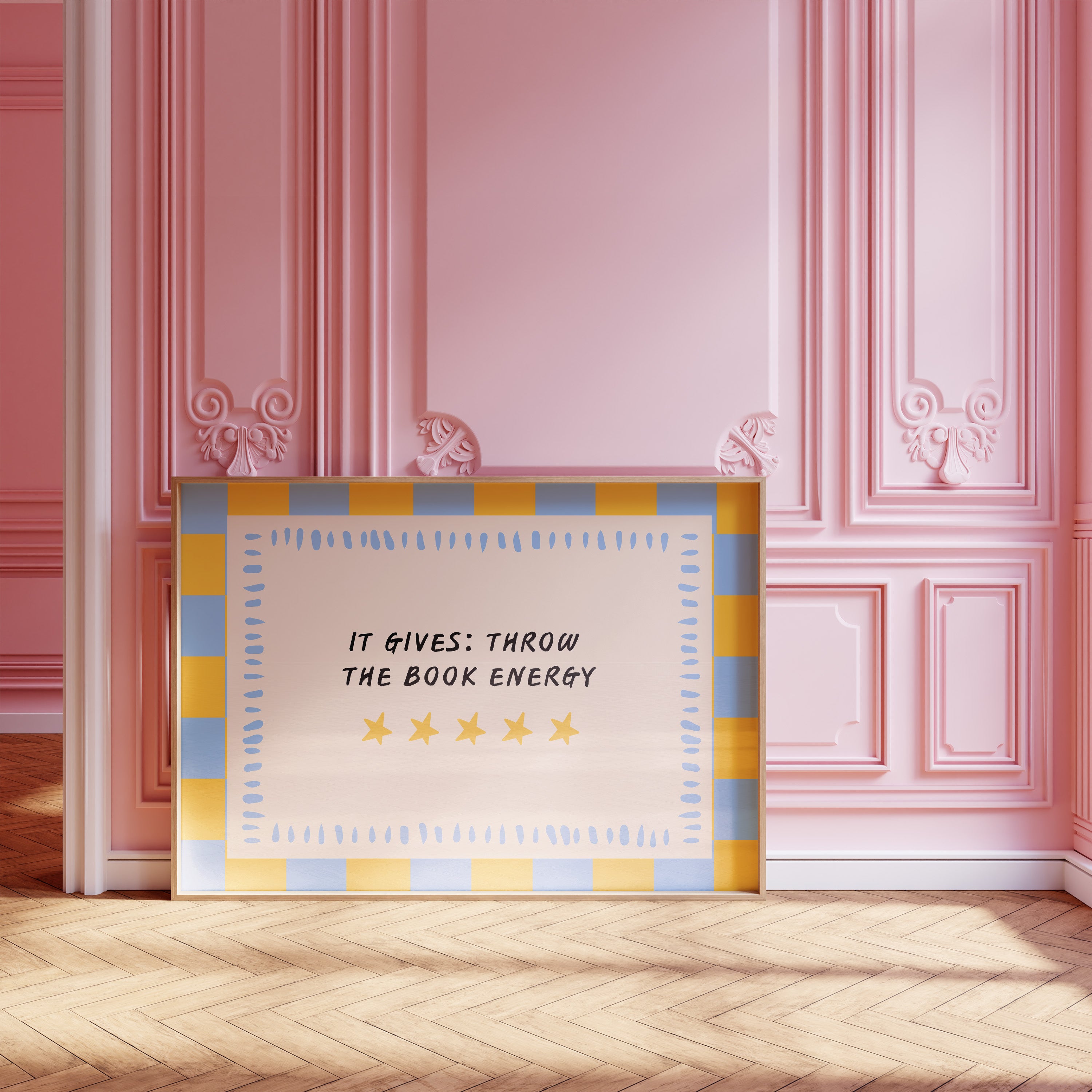 It Gives: Throw the Book Energy horizontal 24x36 bookish wall art poster leaning against a pink paneled wall on a herringbone wood floor