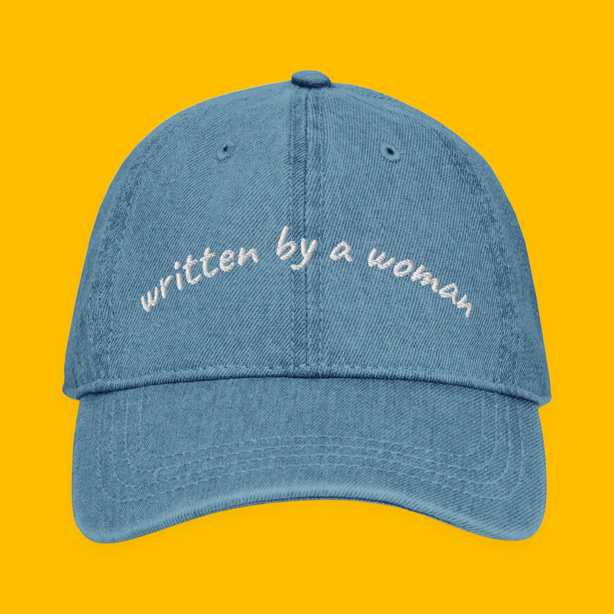 Written by a Woman Embroidered Denim Hat with embroidered "Written by a Woman" design